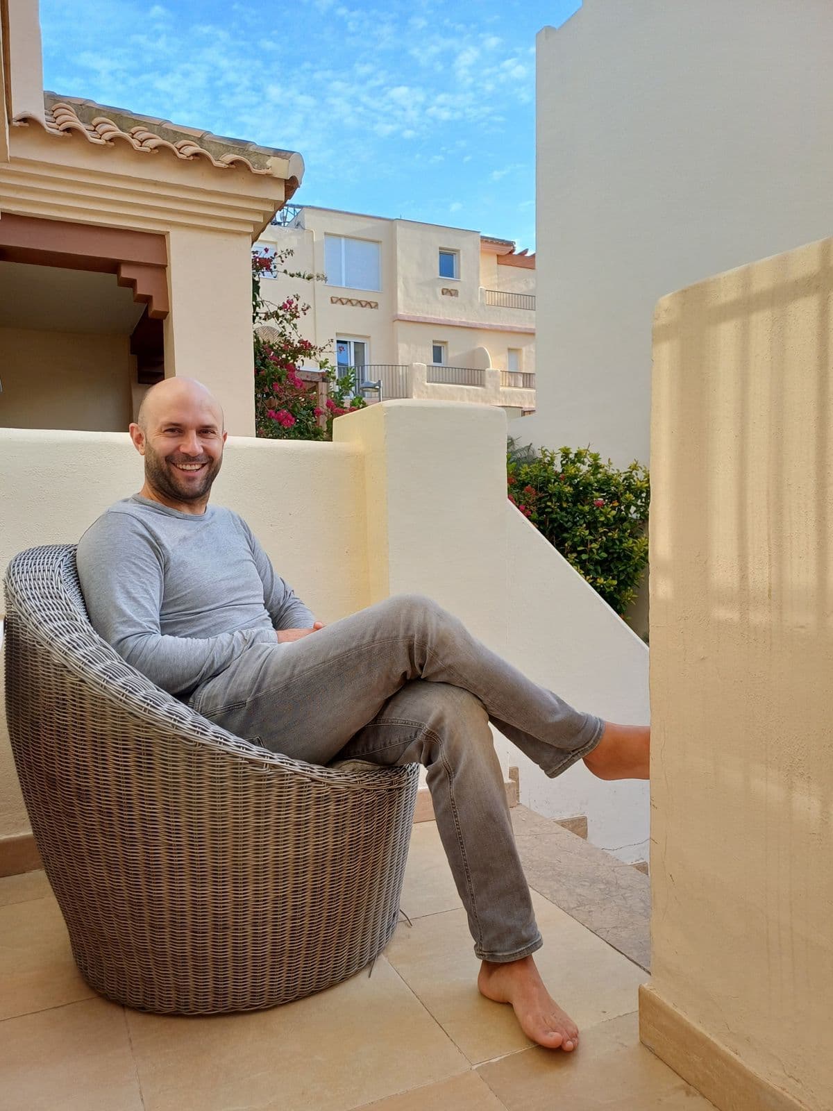 Milan relaxing on a terrace